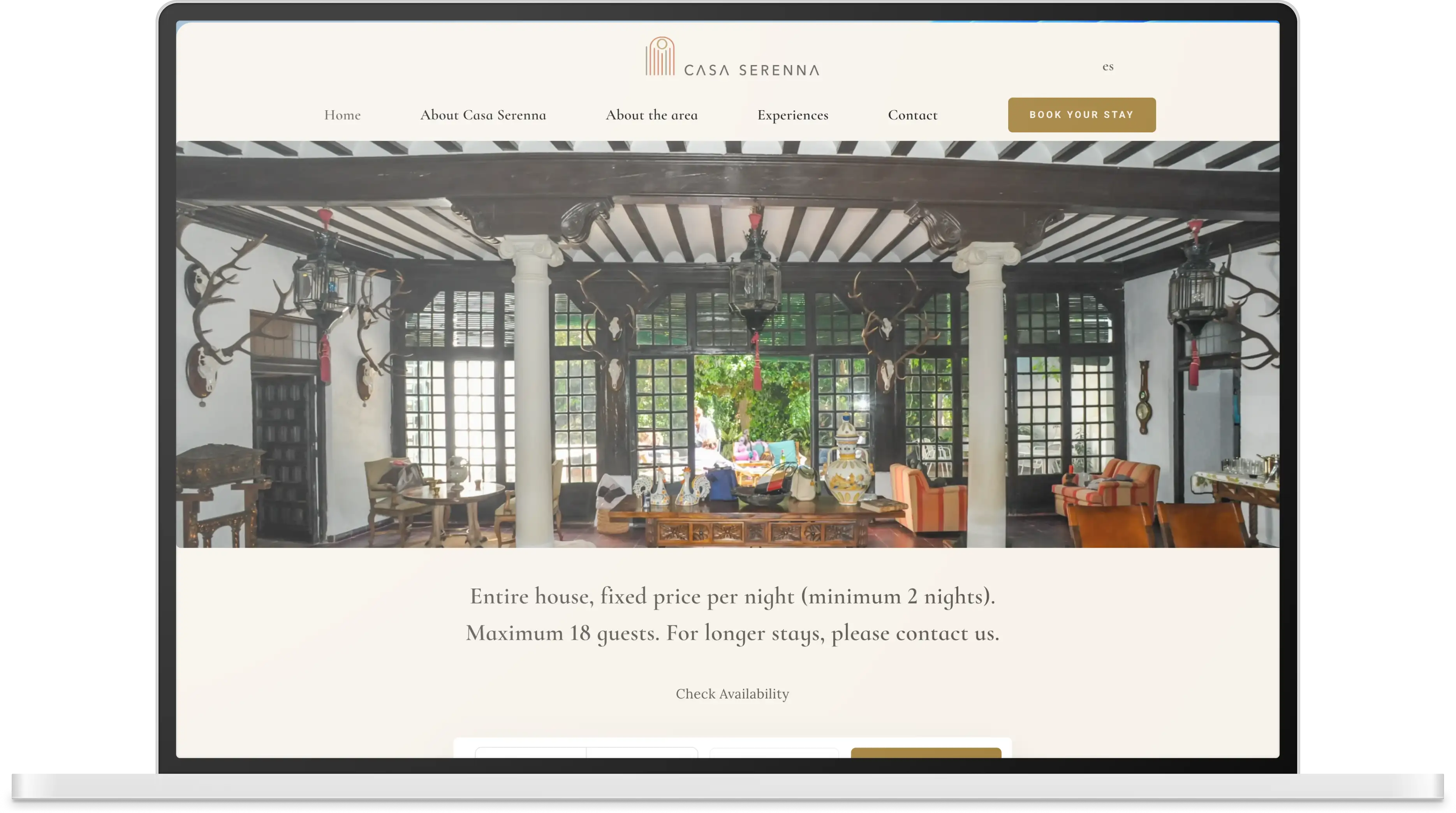 The Casa Serenna website shown on a laptop, opening on the villa's plant-filled veranda